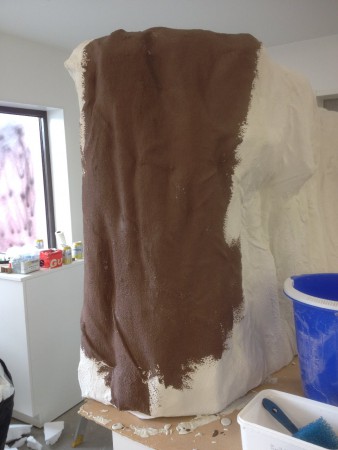 Test med pigmentfärg iblandad i husfixen I detta fall bränd umbra